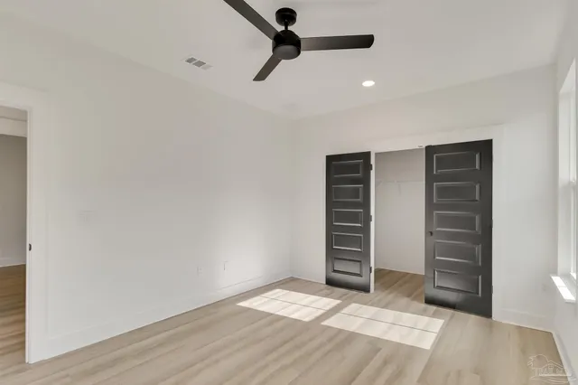 a view of room with closet and stairs