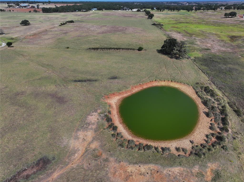 10000 Colony Road Tolar, TX 76476 - Photo 15 of 18 a view of a swimming pool and outdoor space