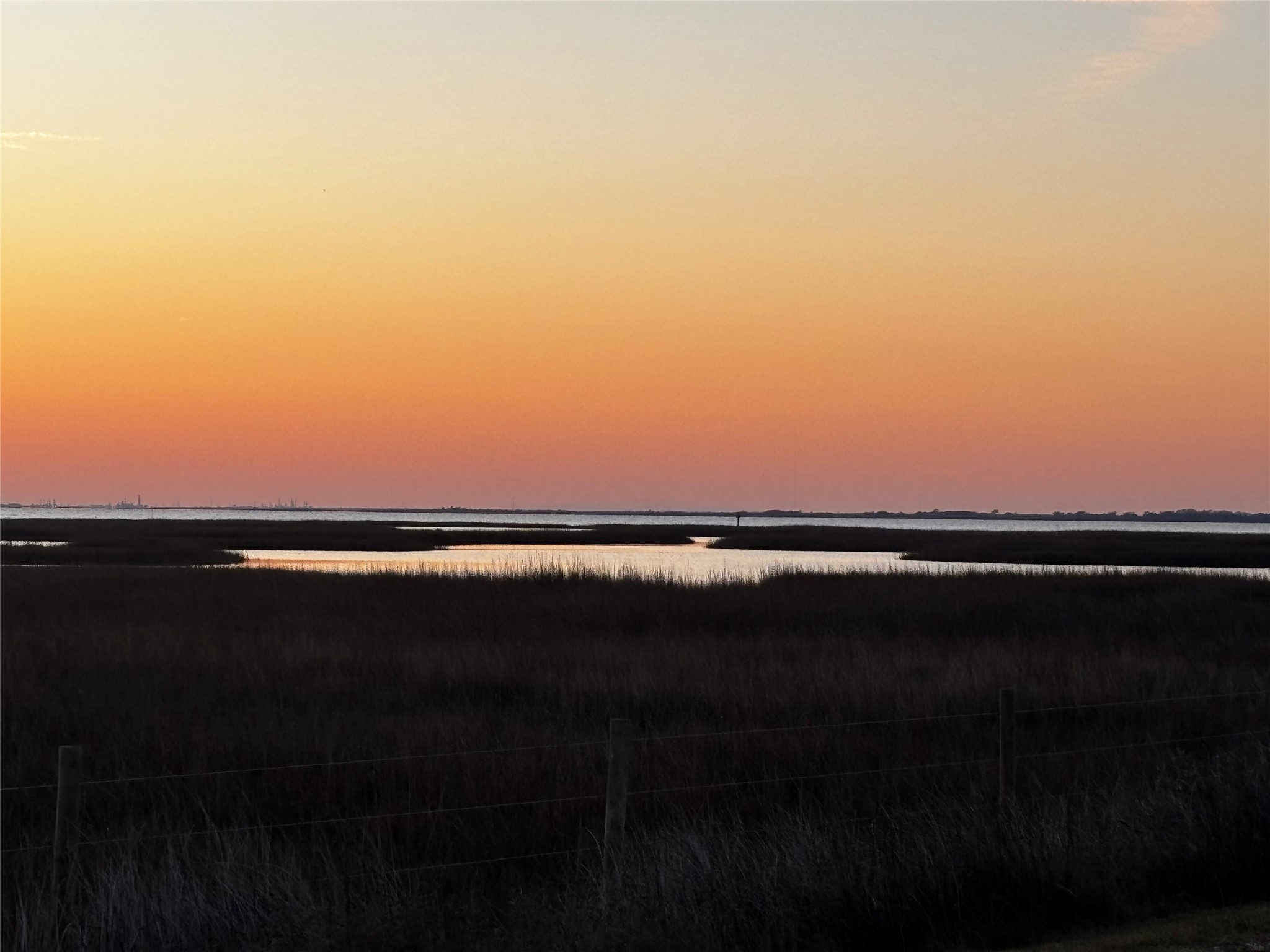 16714 Curlew Road Jamaica Beach, TX 77554 - Photo 12 of 13 a view of an ocean from a city