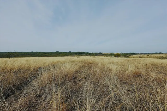 a view of a lake view with houses in back