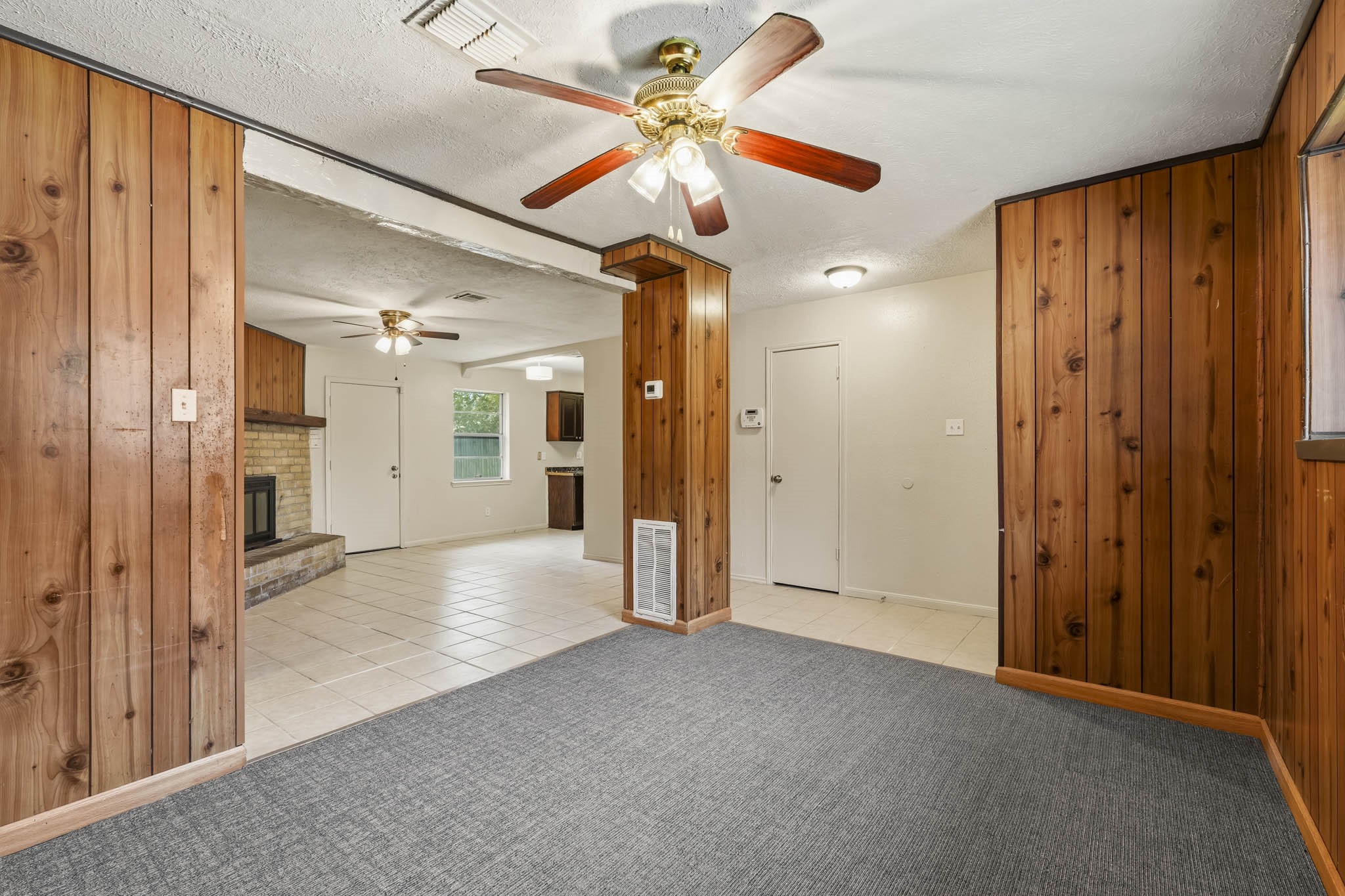 5315 Ridgestone Street Houston, TX 77053 - Photo 6 of 19 View from the den looking into the living area, showcasing the home’s open and connected layout.
