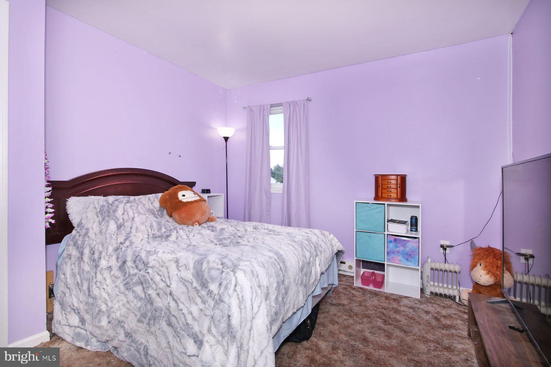 25 Walnut Mill Lane Cleona, PA 17042 - Photo 12 of 17 a bedroom with a bed and a lamp