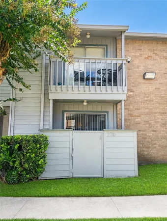 a view of front of house with a yard