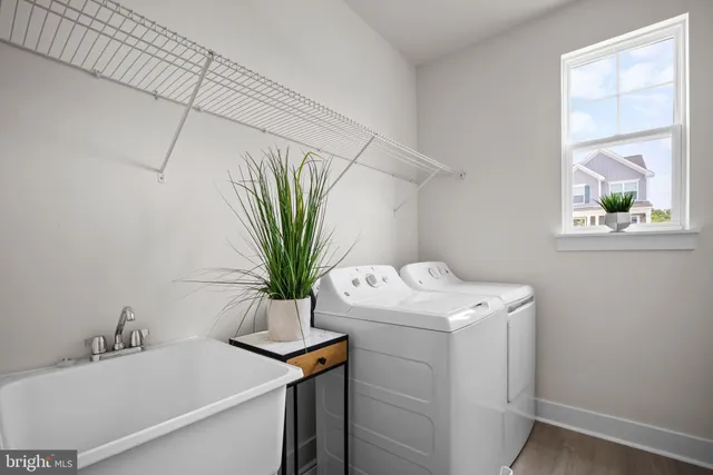 a view of living room with furniture and chandelier