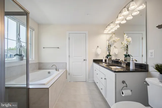 an empty room with a empty space and windows