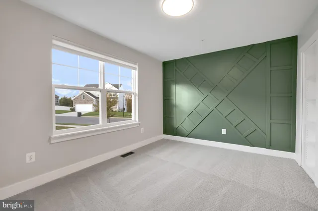 a view of a back yard of the house