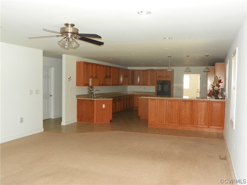 7900 Bull Hill Road Prince George, VA 23875 - Photo 11 of 24 a kitchen with stainless steel appliances granite countertop a refrigerator and a sink