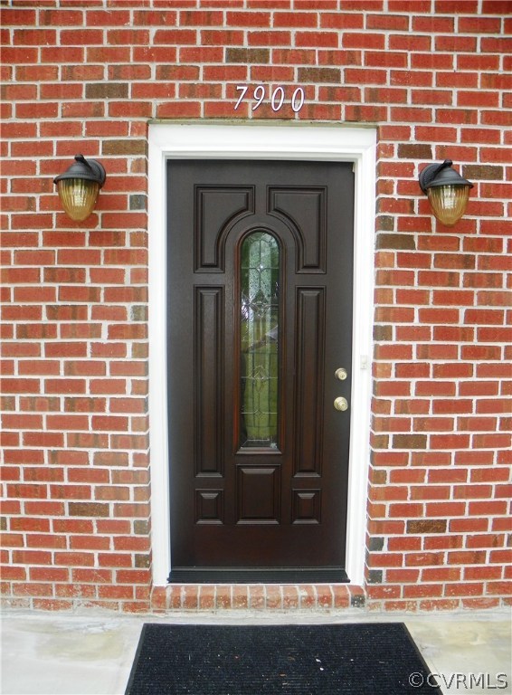 7900 Bull Hill Road Prince George, VA 23875 - Photo 4 of 24 a view of a door of a brick building
