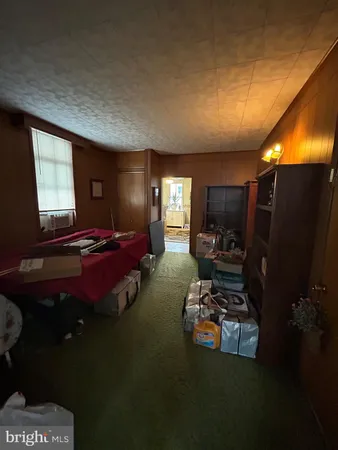 a room with furniture and a flat screen tv