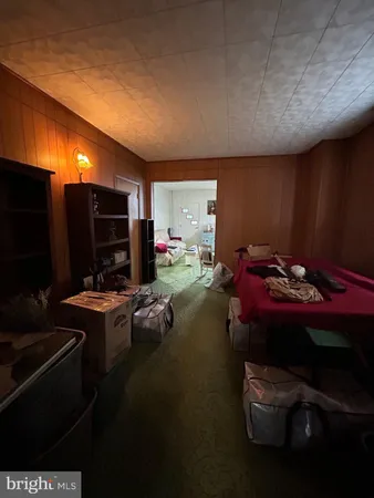 a kitchen with sink refrigerator and stove