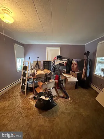 a room with furniture and a flat screen tv