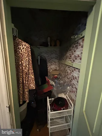 a room with furniture rug and window