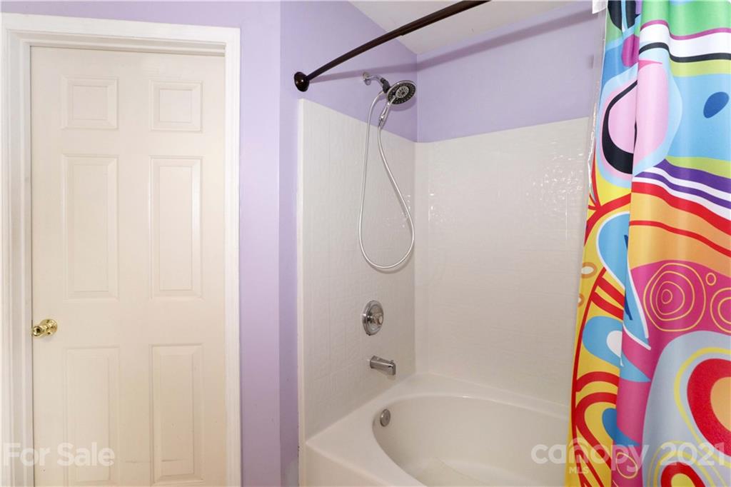 120 Cinebar Road Mooresville, NC 28115 - Photo 18 of 36 a bathroom with a bath tub and a shower curtain
