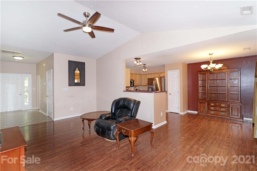 120 Cinebar Road Mooresville, NC 28115 - Photo 7 of 36 a living room with furniture and wooden floor