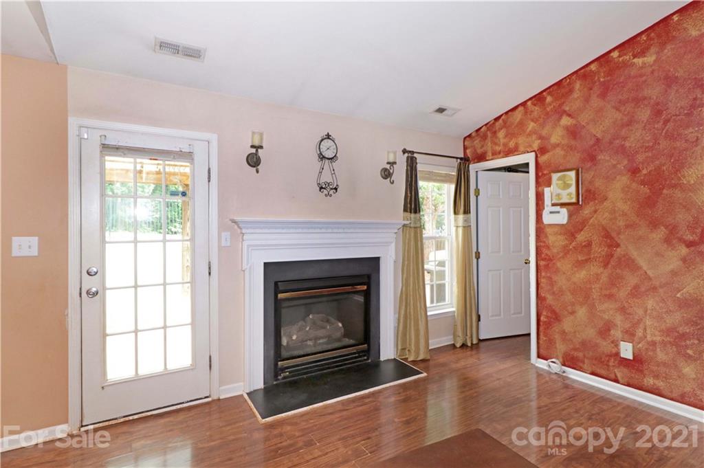 120 Cinebar Road Mooresville, NC 28115 - Photo 8 of 36 a living room with a fireplace
