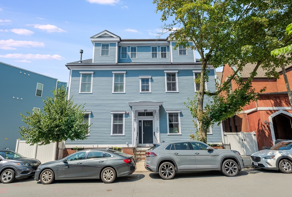 480 East 4th Street, Unit 3 Boston, MA 02127 - Photo 25 of 25 a car parked in front of a house
