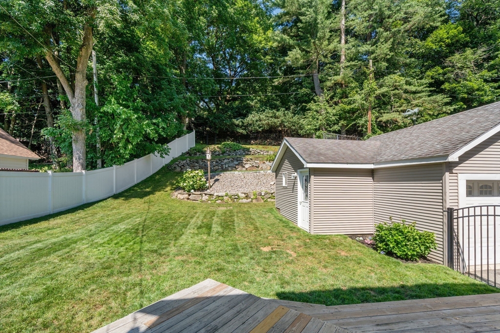 43 Laconia Road Worcester, MA 01609 - Photo 23 of 37 a view of a backyard with large trees