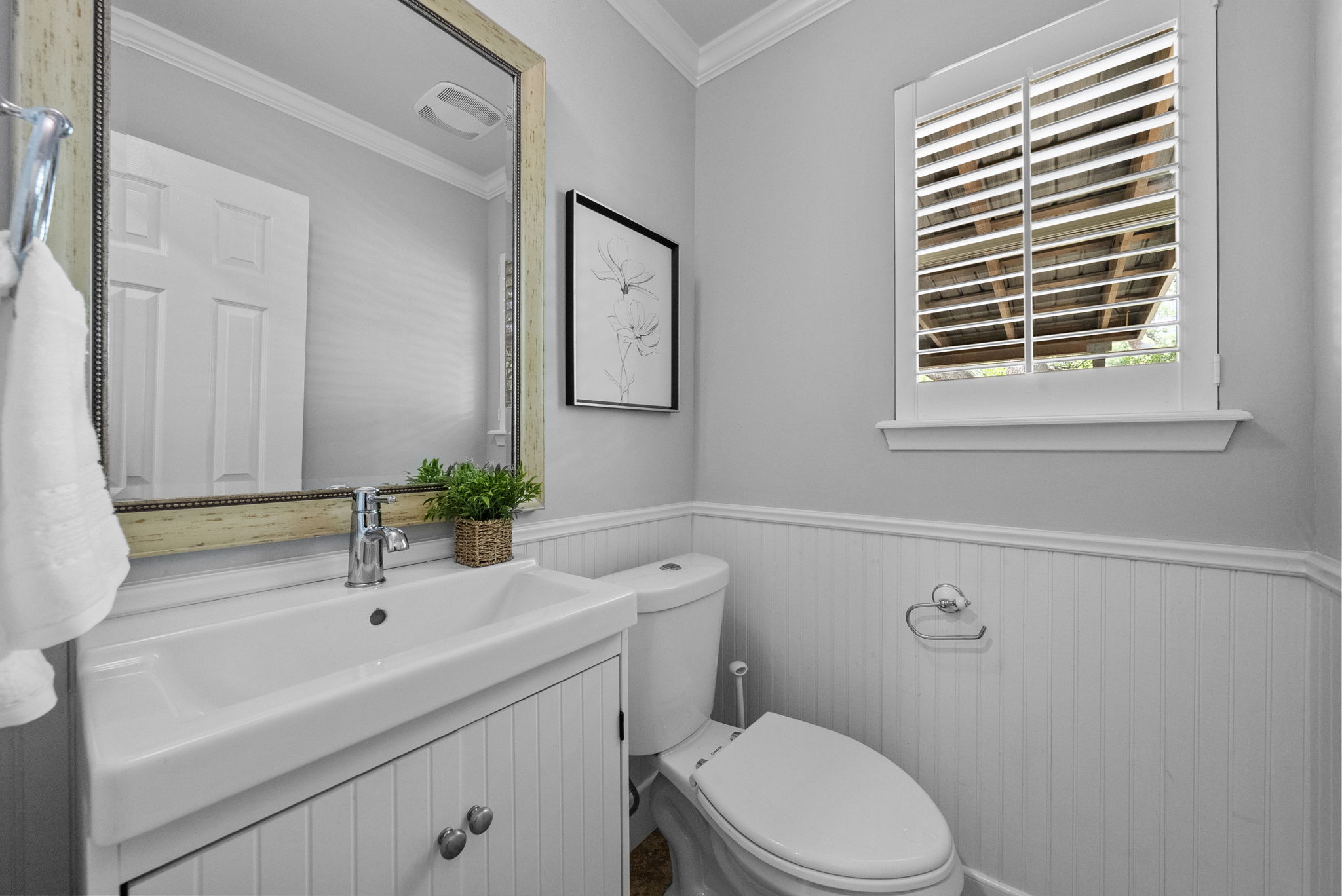 11405 Pyreneese Drive Austin, TX 78759 - Photo 11 of 37 a bathroom with a sink a toilet and a mirror