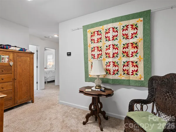 a view of a livingroom with furniture and window