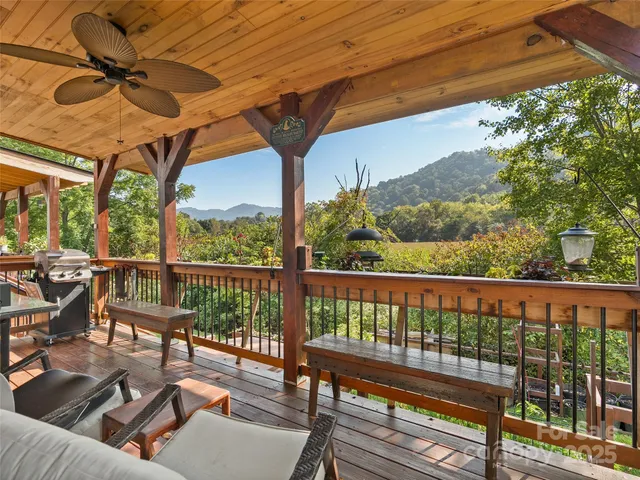 a view of a chairs and table in patio