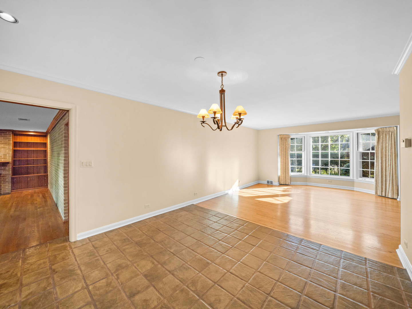 1125 Golfview Road Glenview, IL 60025 - Photo 12 of 44 an empty room with wooden floor and windows