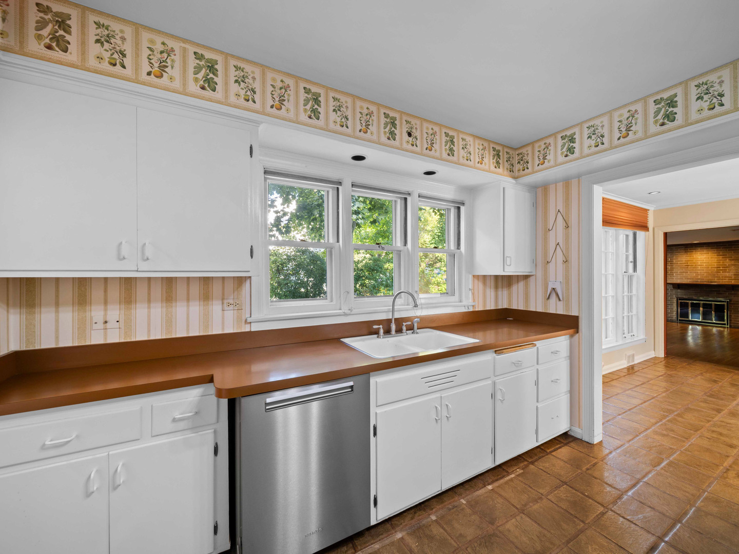 1125 Golfview Road Glenview, IL 60025 - Photo 15 of 44 a kitchen with a sink and cabinets