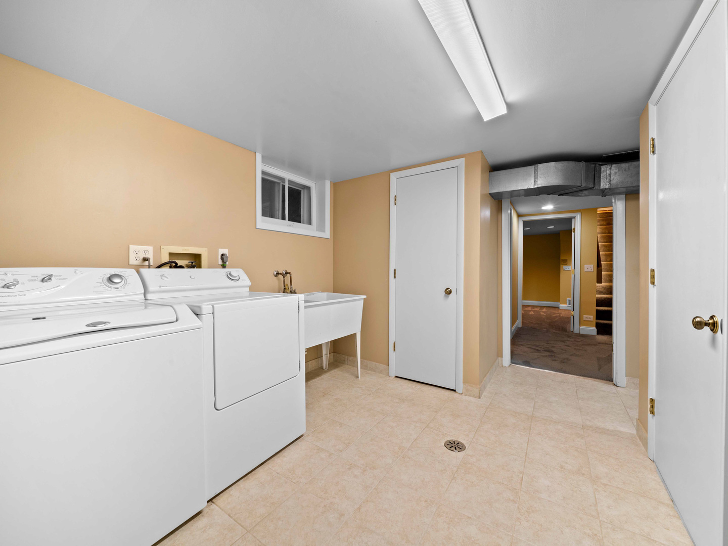 1125 Golfview Road Glenview, IL 60025 - Photo 40 of 44 a utility room with dryer and washer