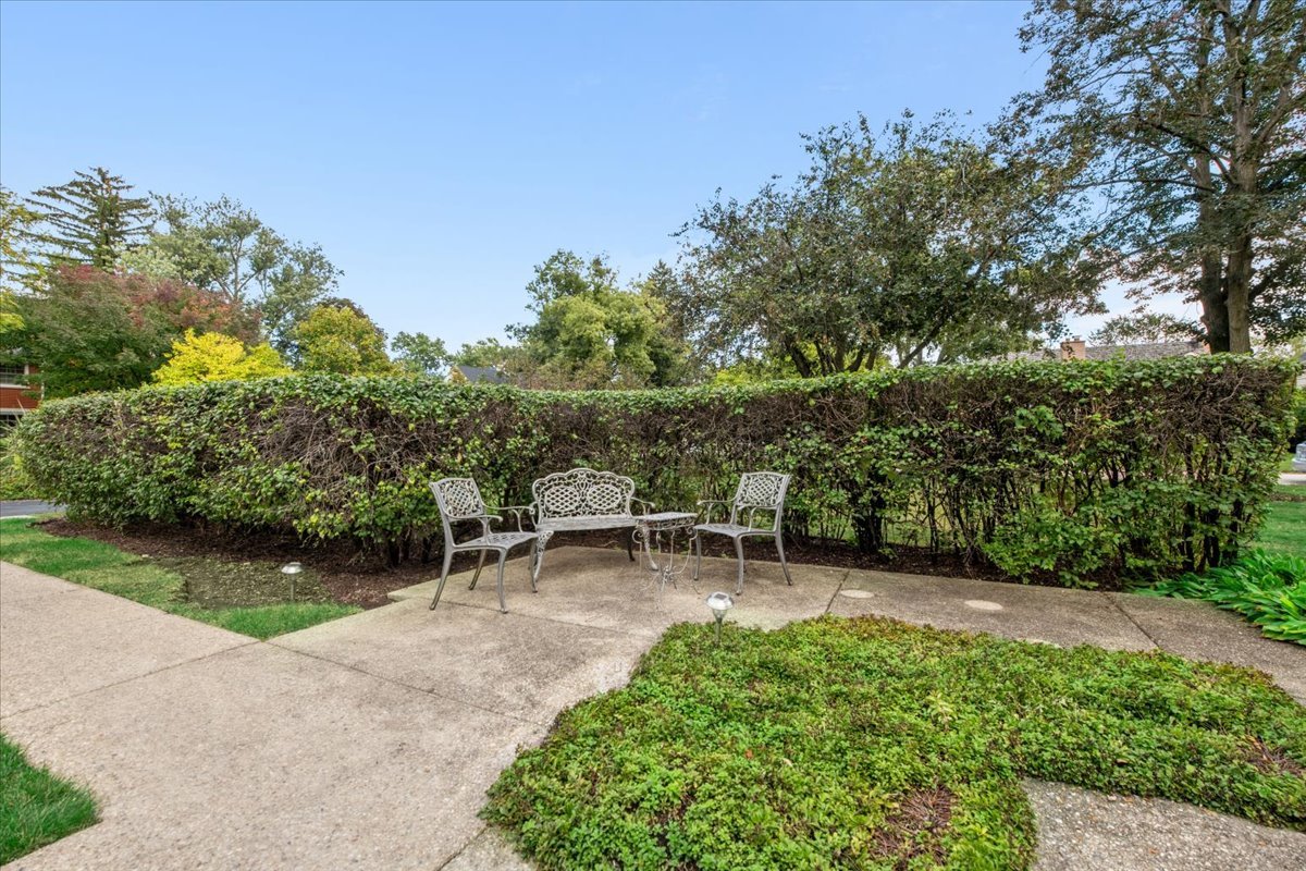 1125 Golfview Road Glenview, IL 60025 - Photo 4 of 44 a view of a bench in a garden