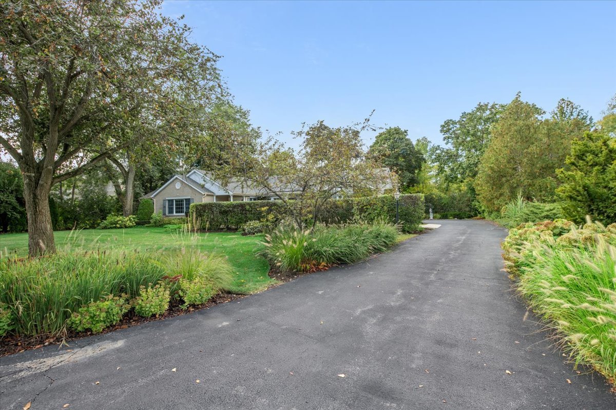 1125 Golfview Road Glenview, IL 60025 - Photo 6 of 44 a front view of a house with a yard