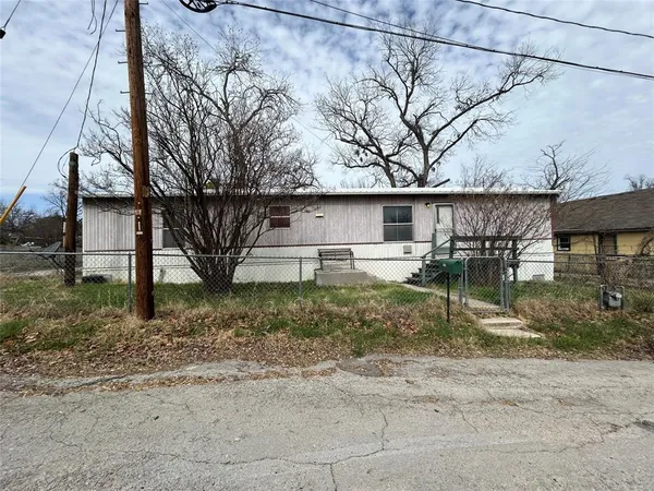 front view of house with a yard
