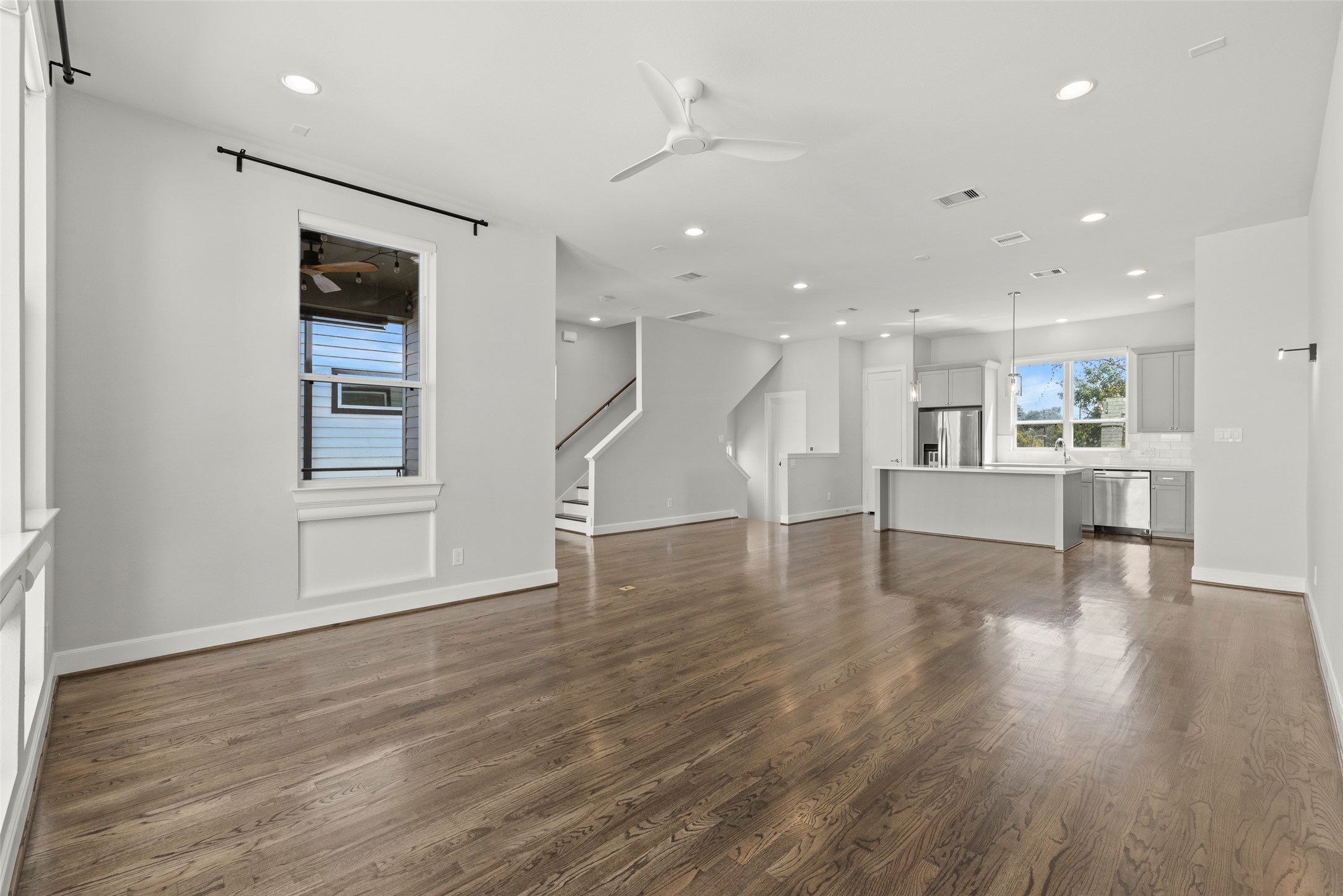 6315 Timbergrove Gardens Lane Houston, TX 77008 - Photo 13 of 33 an empty room with wooden floor and windows