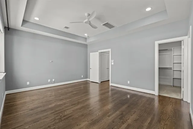 a bathroom with a shower and a sink