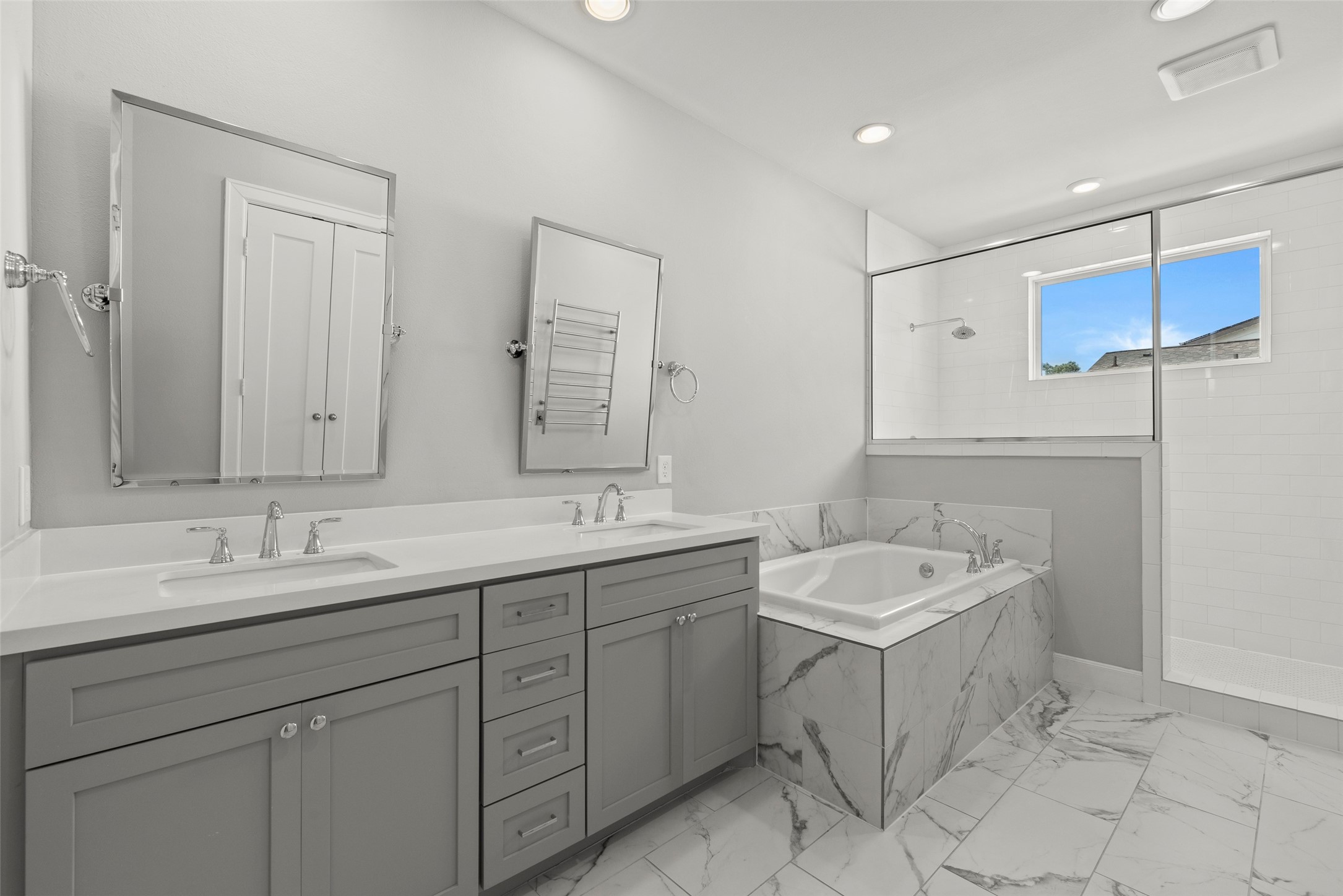 6315 Timbergrove Gardens Lane Houston, TX 77008 - Photo 29 of 33 a bathroom with a sink double vanity and a mirror