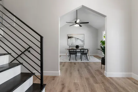 a view of a livingroom with furniture and wooden floor