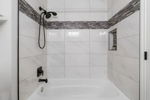 a bathroom with a bathtub