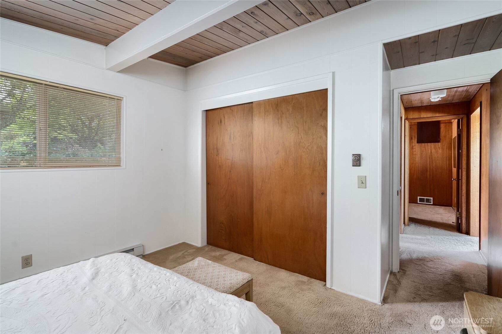 3360 Green Road Oak Harbor, WA 98277 - Photo 16 of 35 a bedroom with a bed and a painting on the wall