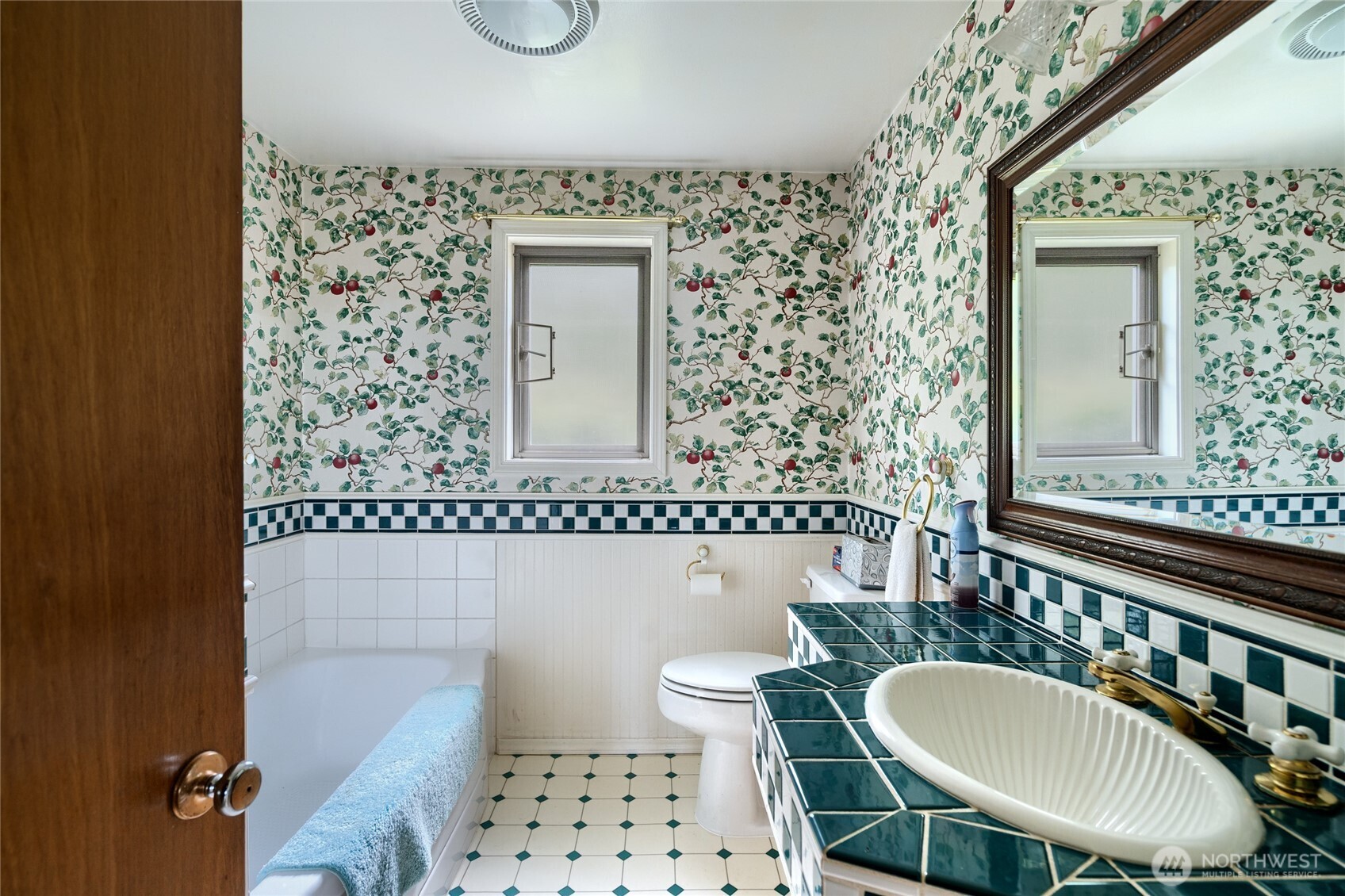 3360 Green Road Oak Harbor, WA 98277 - Photo 17 of 35 a bathroom with a sink a toilet and a mirror