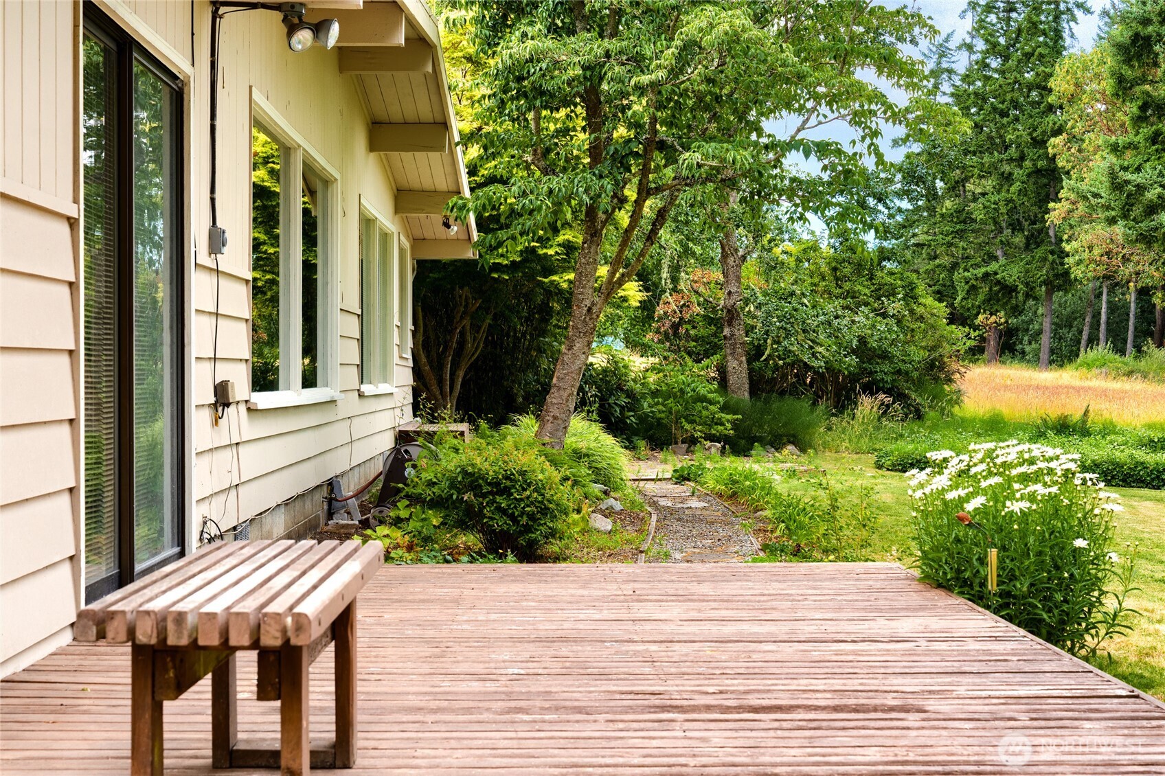 3360 Green Road Oak Harbor, WA 98277 - Photo 28 of 35 a view of a house with backyard and sitting area