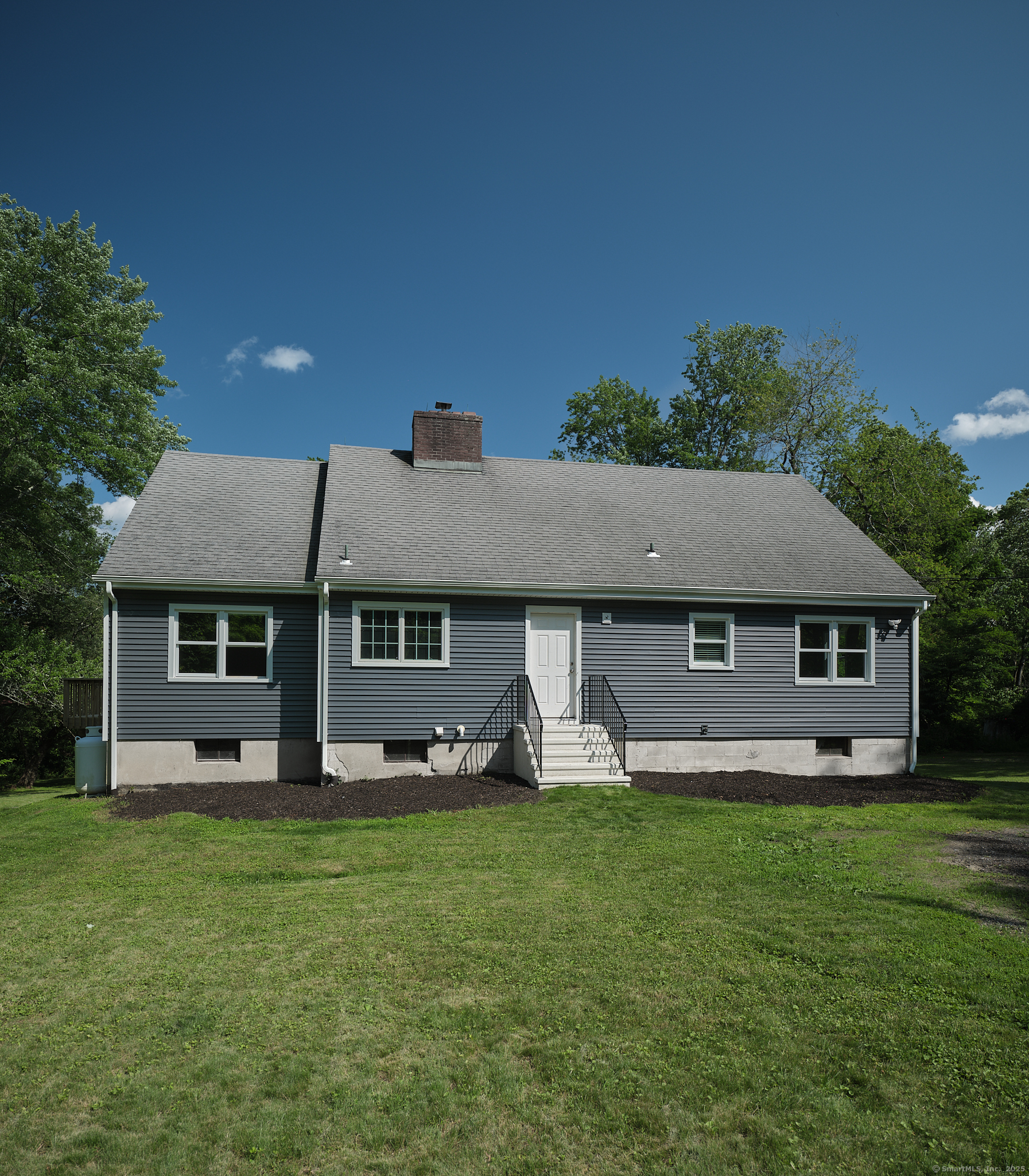 22 Lonetown Road Redding, CT 06896 - Photo 2 of 37 front view of a house with yard