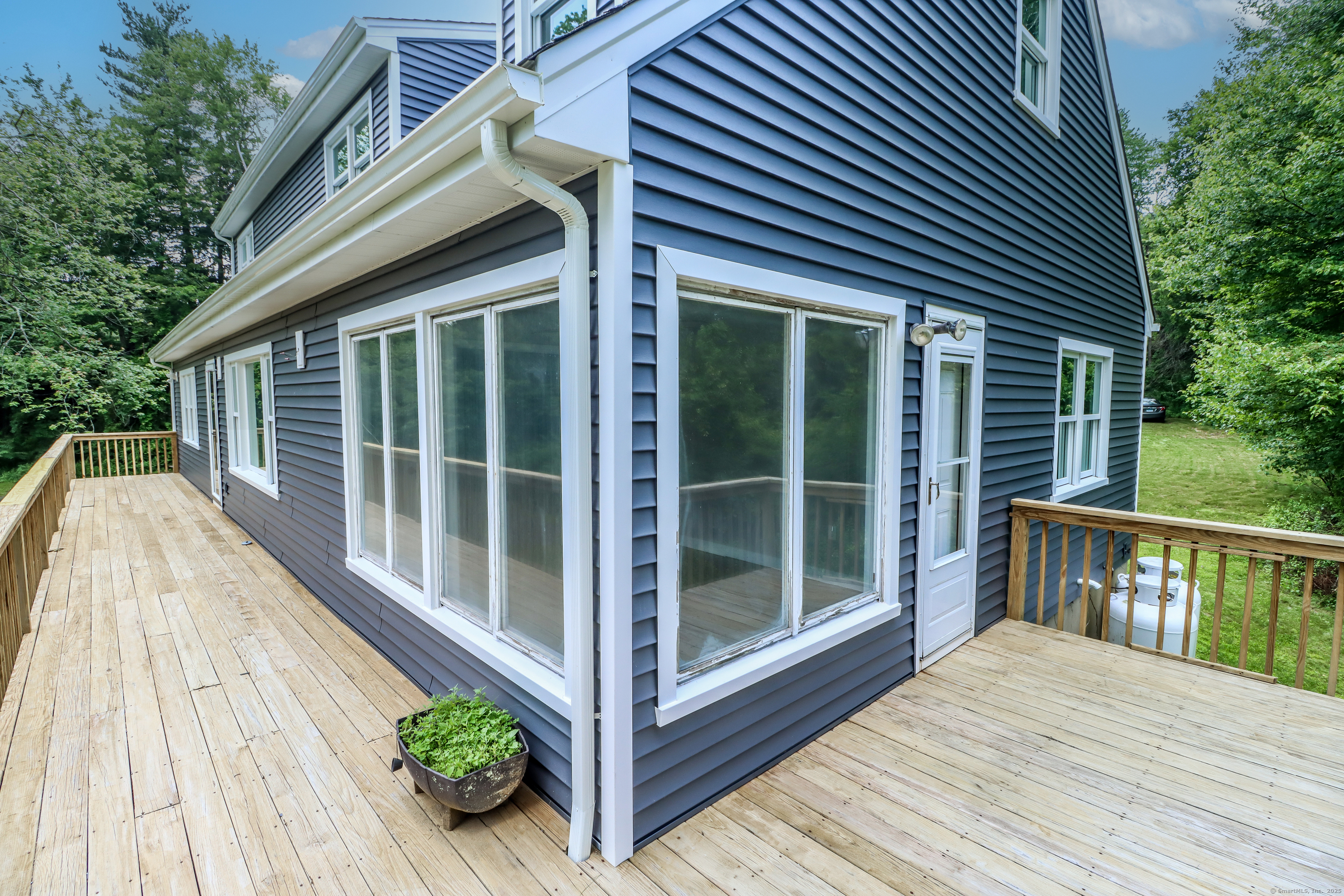 22 Lonetown Road Redding, CT 06896 - Photo 28 of 37 a view of a house with a large window