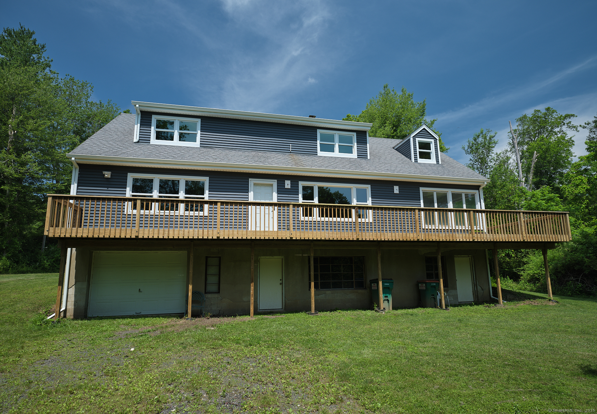 22 Lonetown Road Redding, CT 06896 - Photo 3 of 37 a view of a house with a yard and sitting area