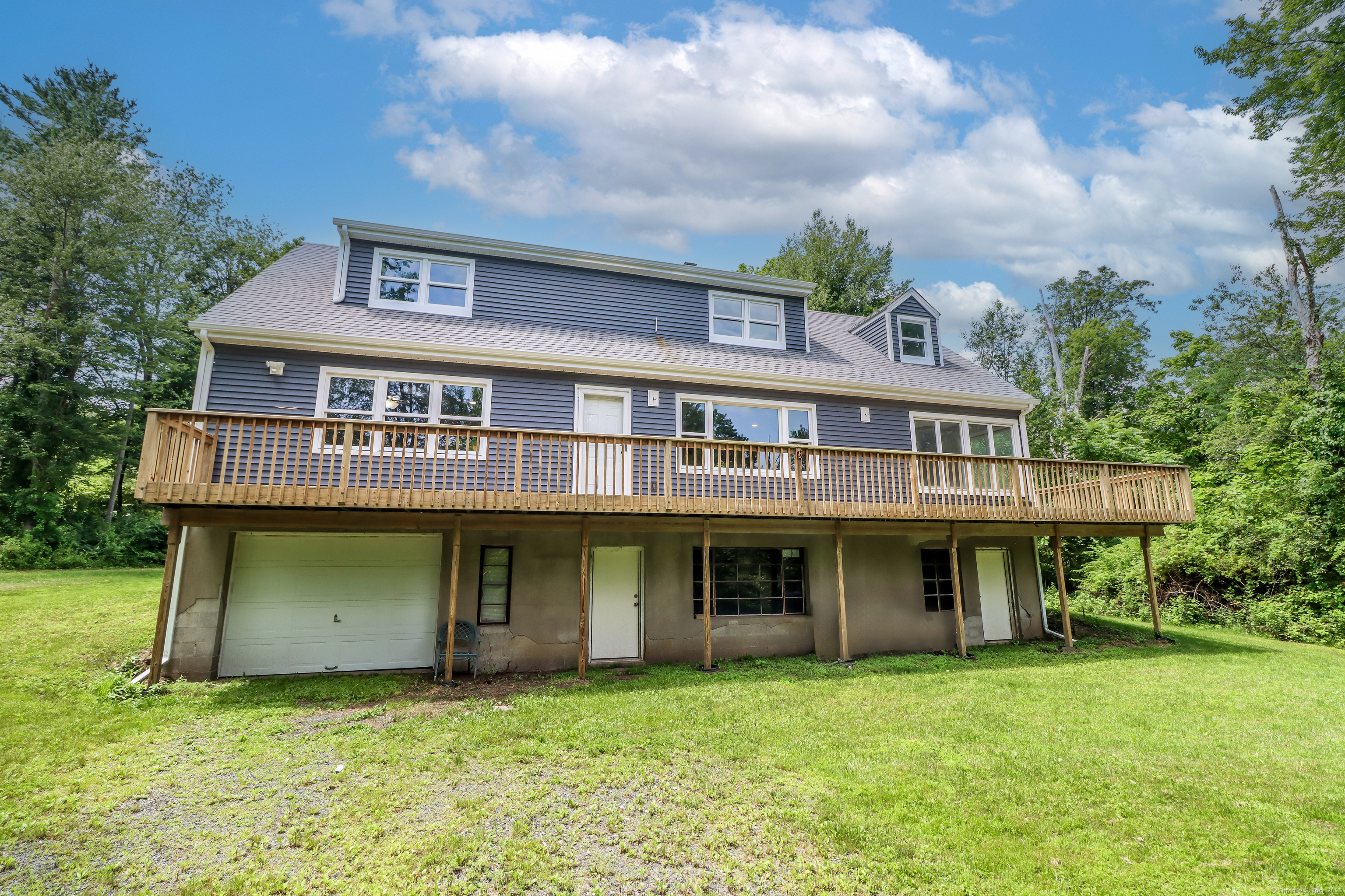 22 Lonetown Road Redding, CT 06896 - Photo 32 of 37 a view of a house with a garden
