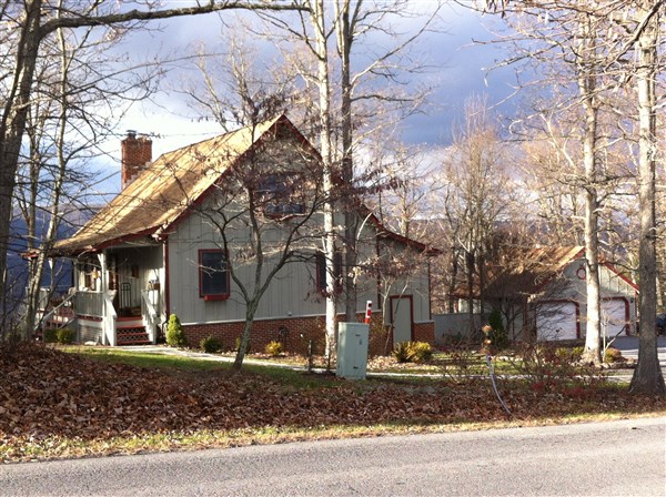 4305 Supinlick Ridge Road Mount Jackson, VA 22842 - Photo 1 of 30 a view of a white house next to a road and yard