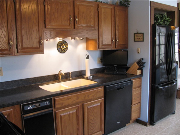 4305 Supinlick Ridge Road Mount Jackson, VA 22842 - Photo 12 of 30 a kitchen with a sink and a refrigerator