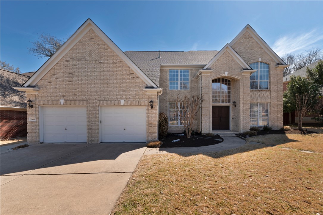 5415 Austral Loop Austin, TX 78739 - Photo 1 of 1 a front view of a house with a yard