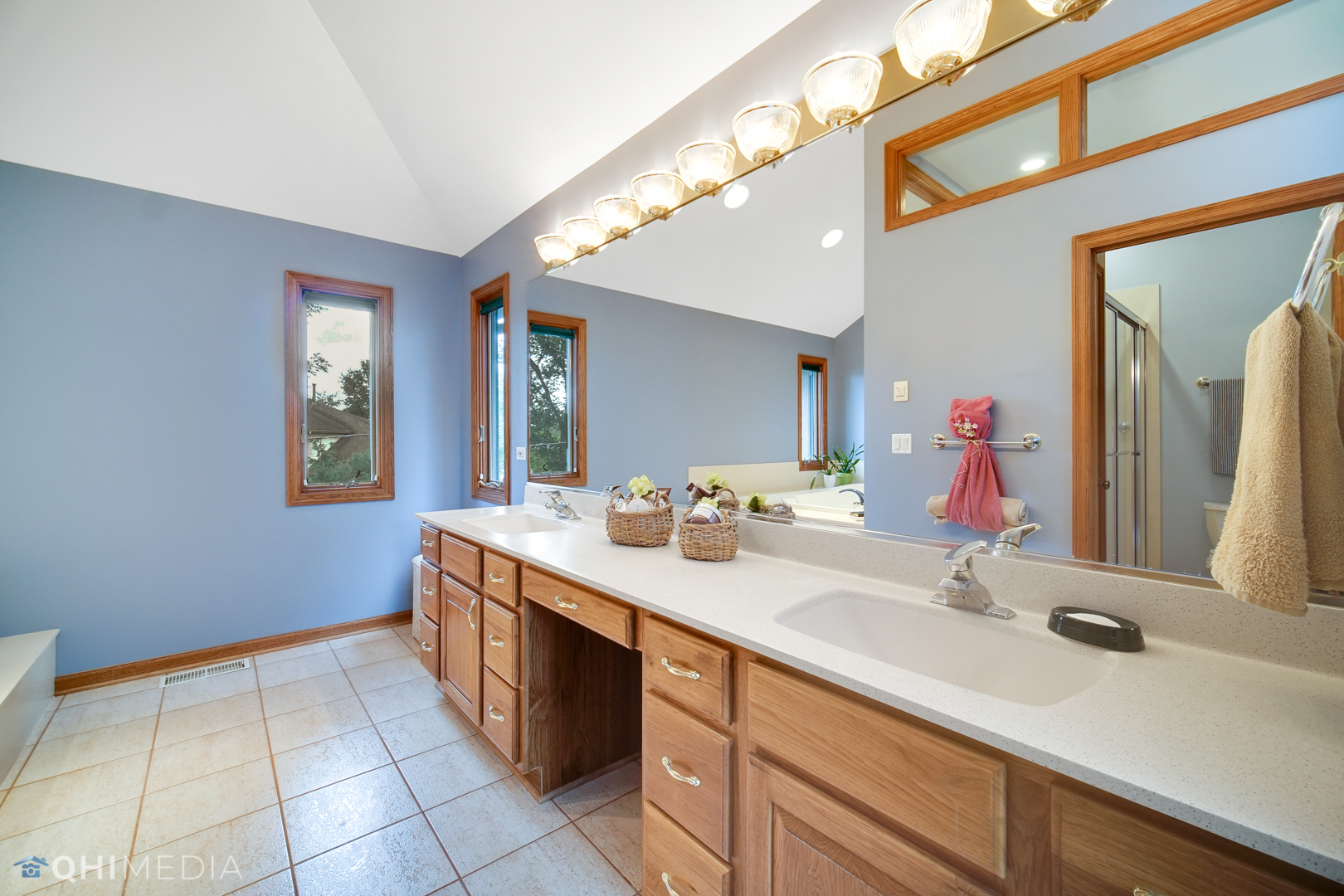 618 Hillside Road Glenview, IL 60025 - Photo 22 of 44 a bathroom with a sink and a mirror