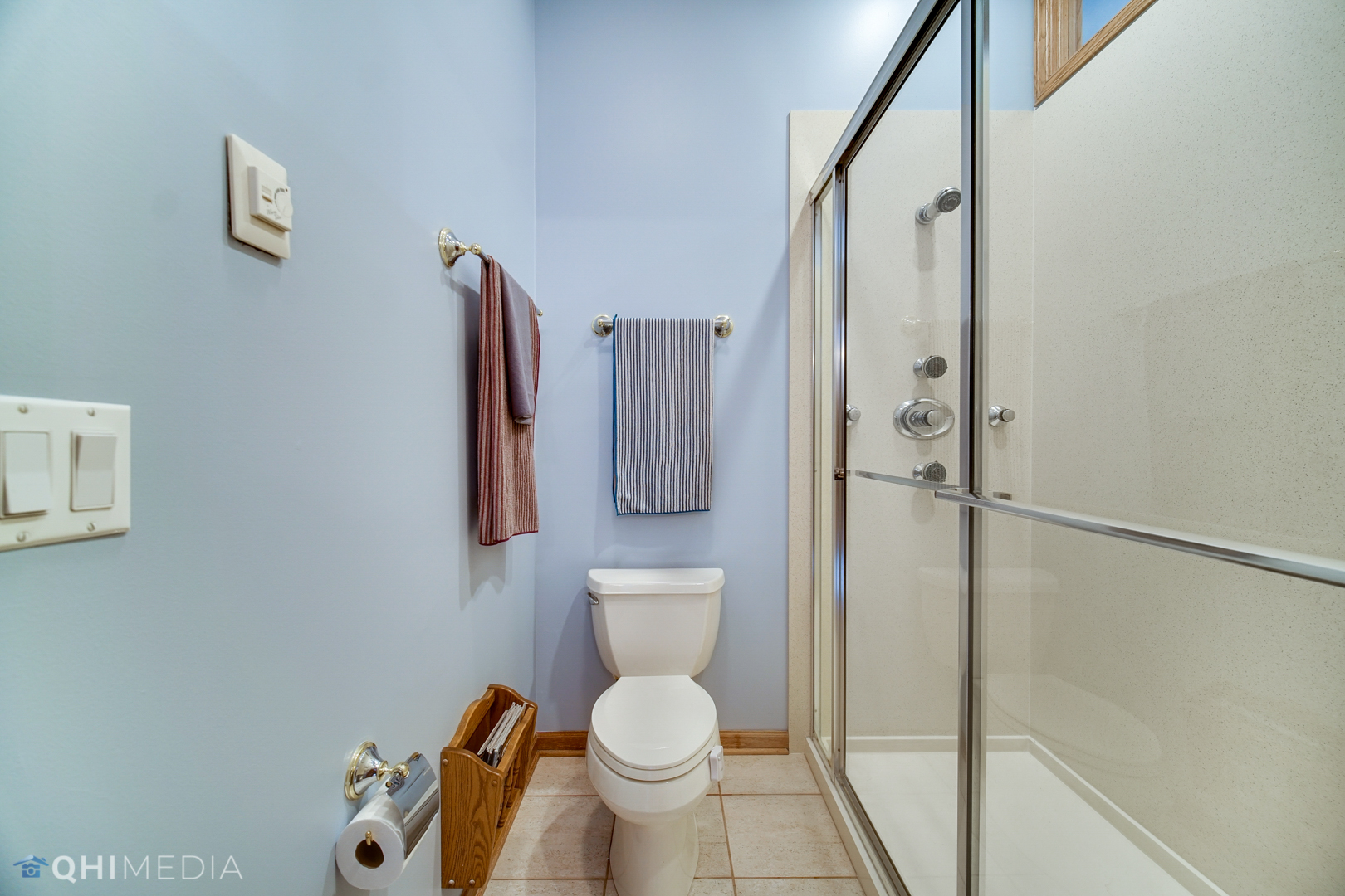 618 Hillside Road Glenview, IL 60025 - Photo 29 of 44 a bathroom with a toilet and a shower