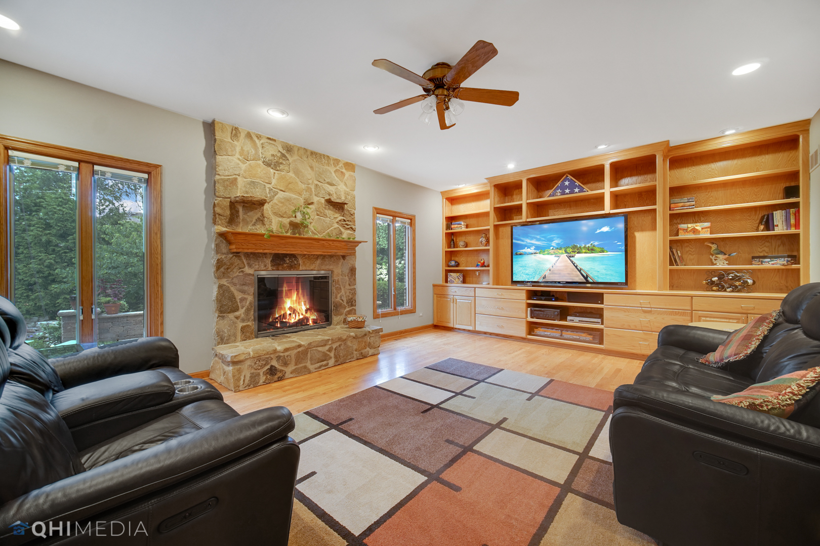 618 Hillside Road Glenview, IL 60025 - Photo 6 of 44 a living room with furniture and a flat screen tv