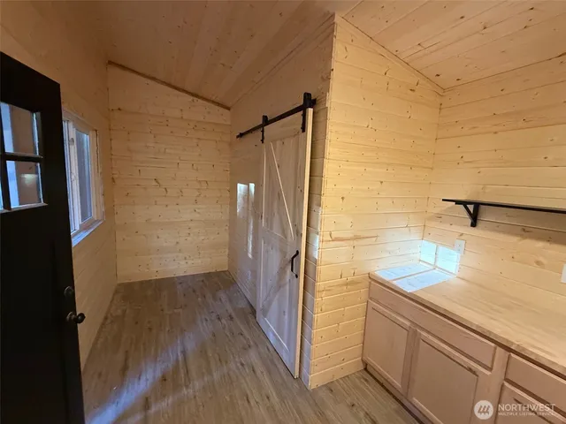 a bathroom with a sink and a shower