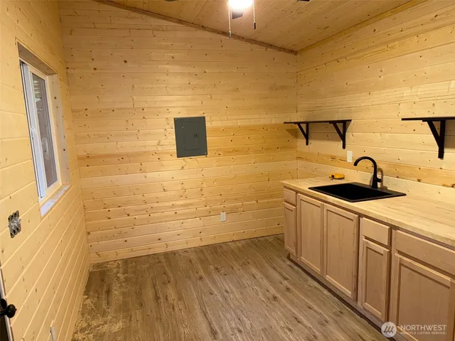 a bathroom with a sink and a shower